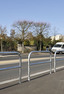 Steel hoop barrier with crossbar for greater strength. In 3 lengths and 1m hight. Concreted in as standard. Trolley bay essential image