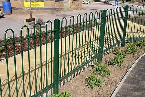 Green coloured with decorative bow topped 1 metre high railings that have a contemporary nice quality look set in residential next to nice paved footpath setting. Note can have in black too.