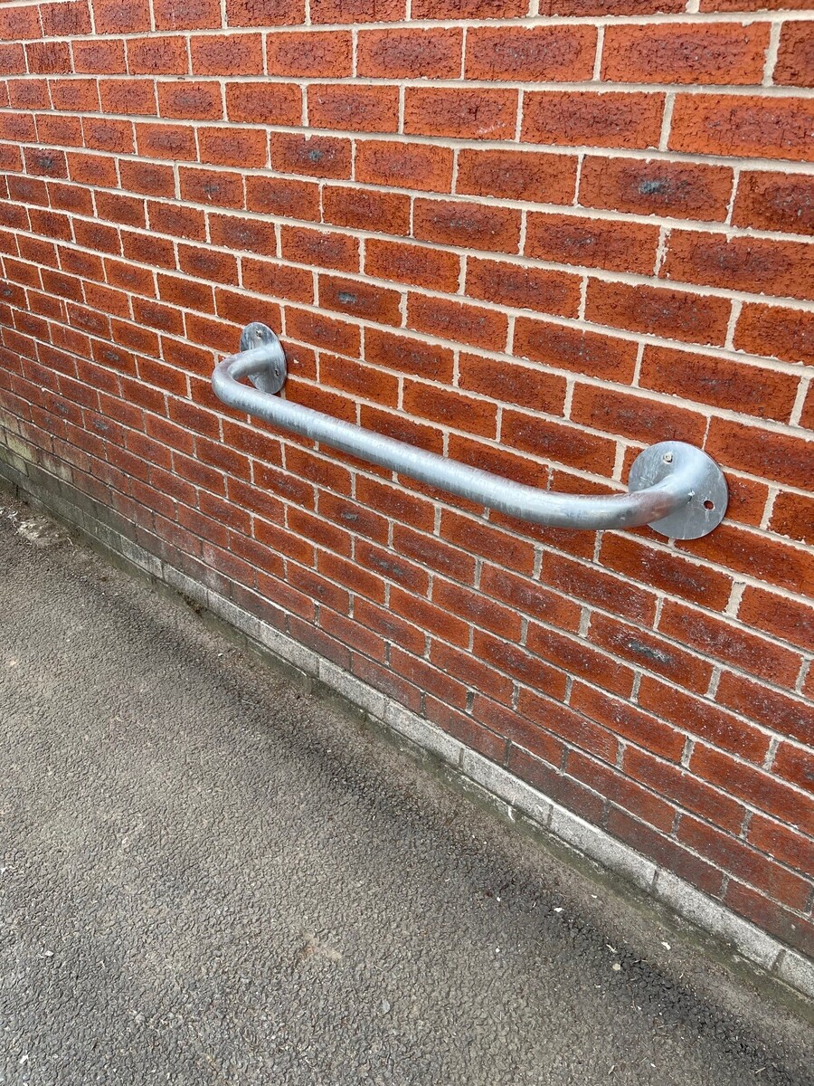 Wall stand for Bicycle at low height for wheel alignment. image