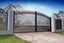 Driveway Double Aluminium Swing-gate with Curved Top in Black Ornate Classic Style. 5 year guarantee.  image