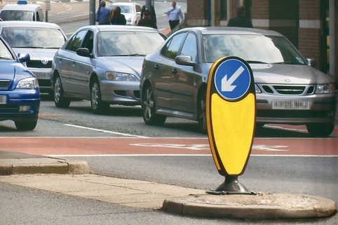 Bounce Back Bollard Keep Left Road-sign in Night Owl Style - Fluorescent Retroreflective material for High Visibility